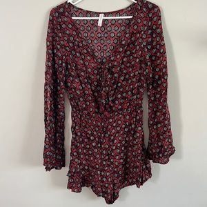 Long bell sleeve shorts romper. Tie in front